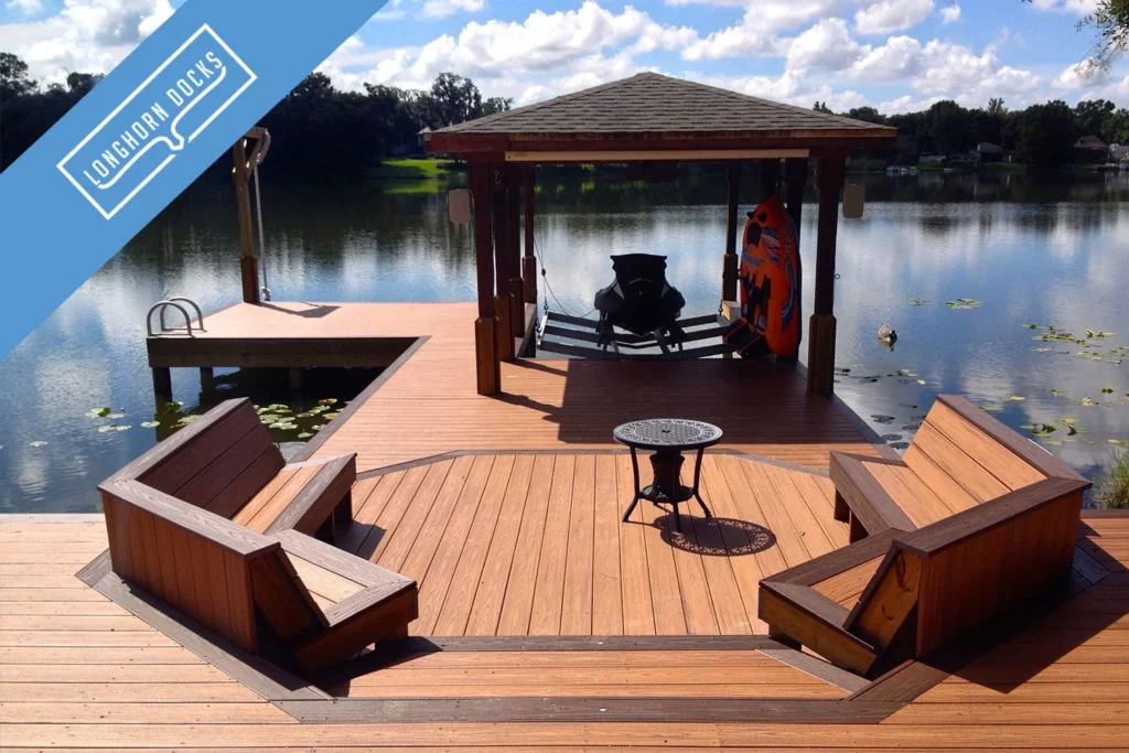 Modern wood dock with built-in seating, jetski slip, and covered boat lift on a lake in Austin, Texas