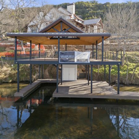 Floating dock with metal roof and ramp access built by Longhorn Docks in Austin and the Texas Hill Country